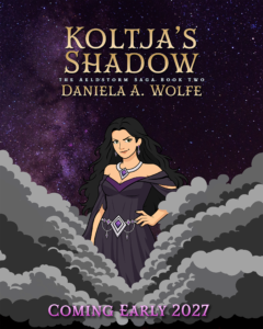 Announcement graphic for Koltja’s Shadow, Book Two of The Aeldstorm Saga by Daniela A. Wolfe, coming early 2027. Koltja, the Dark Maiden, stands amid curling gray clouds beneath a purple, star-filled sky. She has long black hair, green eyes, a knowing smirk, and one hand on her hip. She wears an off-the-shoulder dark purple gown with silver jewelry and purple gemstones. Gold lettering displays the title and author above her; pink lettering announces the release window below.